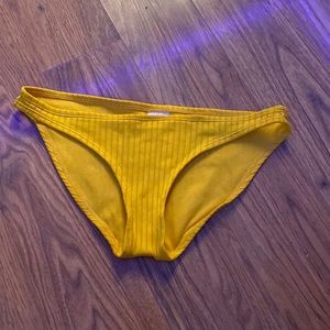 Yellow rubbed swim suit bottom